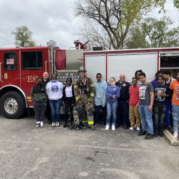 Group of students in front of fire truck