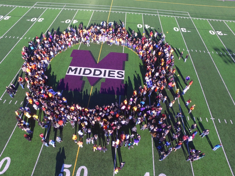 Drone shot of MHS field with students on unity day