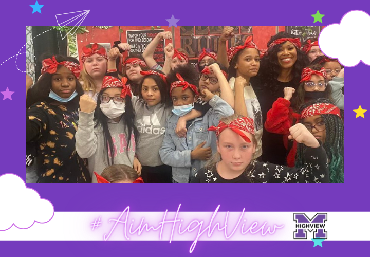Group of students dressed like Rosie the Riveter