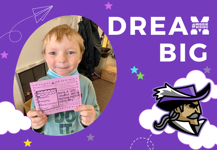 Kindergarten student holding good work card